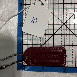 Coach Burgundy Leather Tag